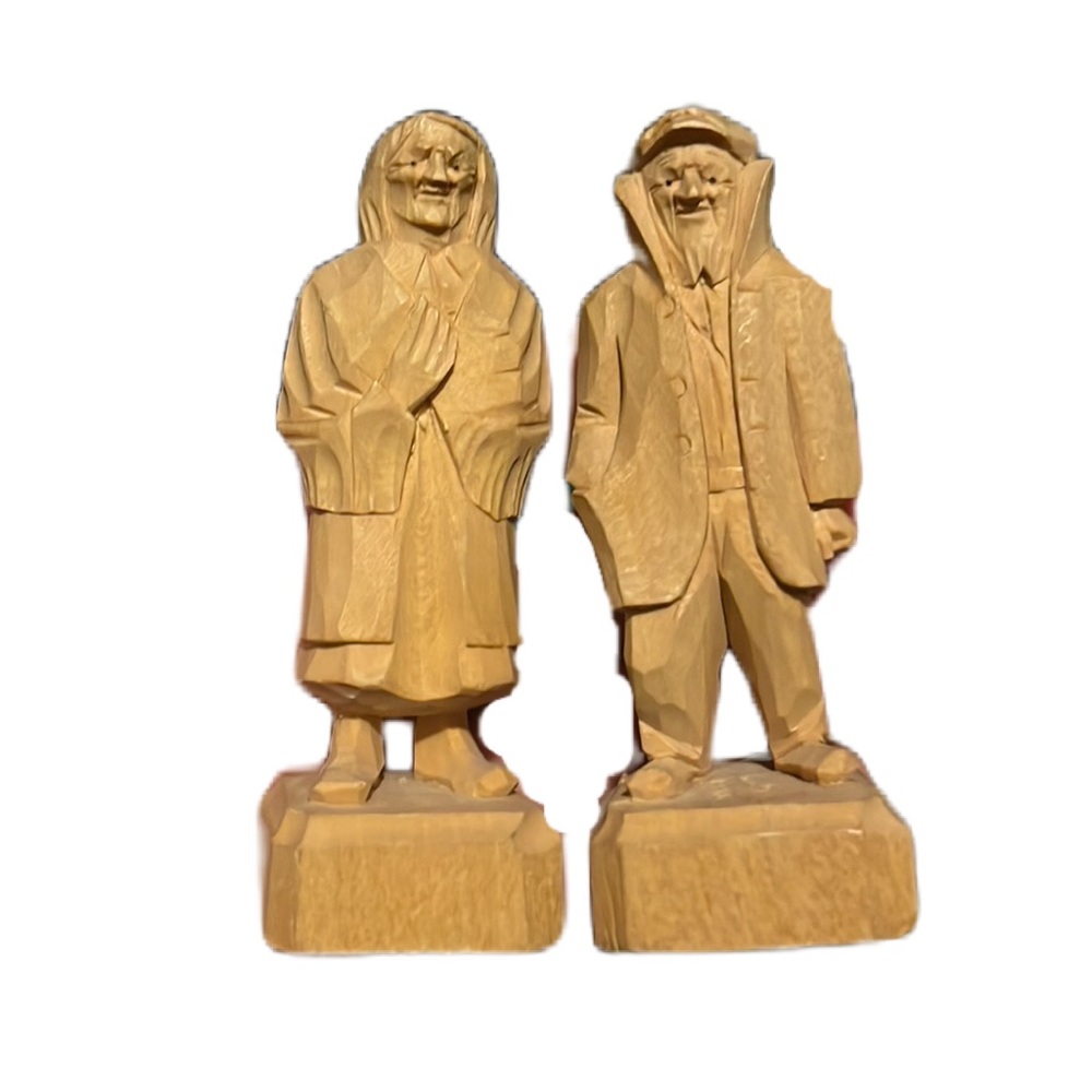 Wooden carved figures by R. Normand